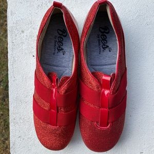 Red sparkly women’s slip on’s